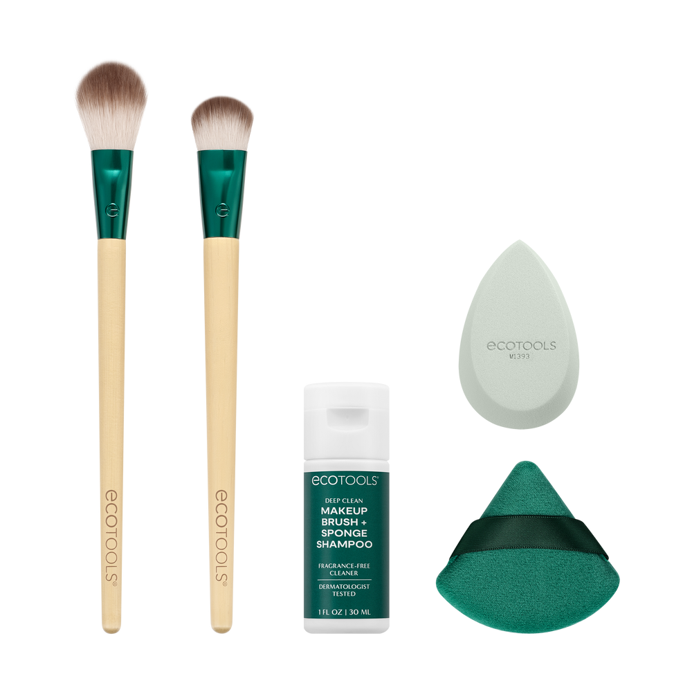 EcoTools face brush set with green-handled brushes, sponge, and cleanser bottle