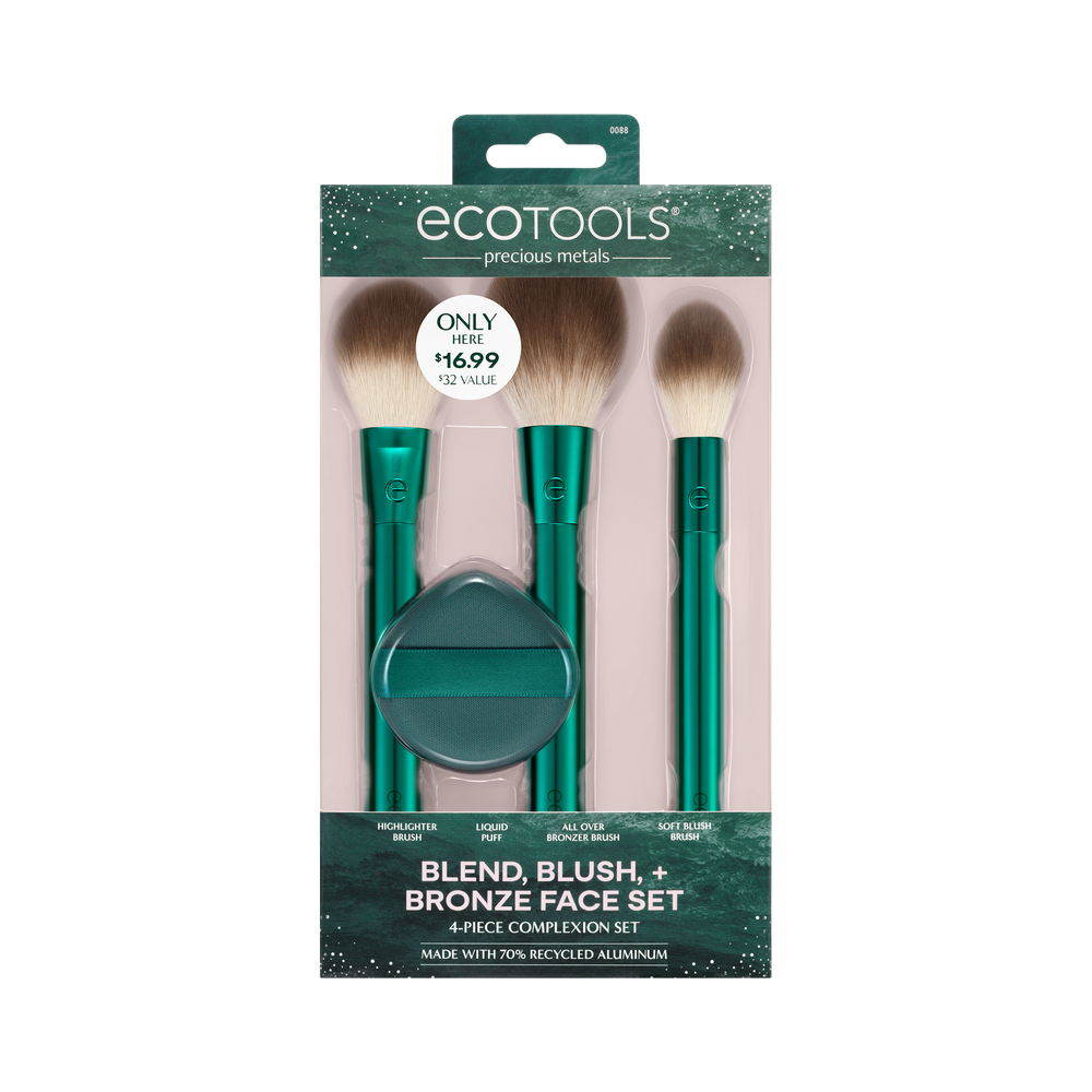 Green makeup brush set with three soft brown bristles and pointed tips