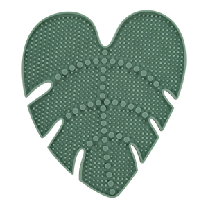 Leaf-shaped green silicone makeup brush cleansing pad with dense cleaning dots