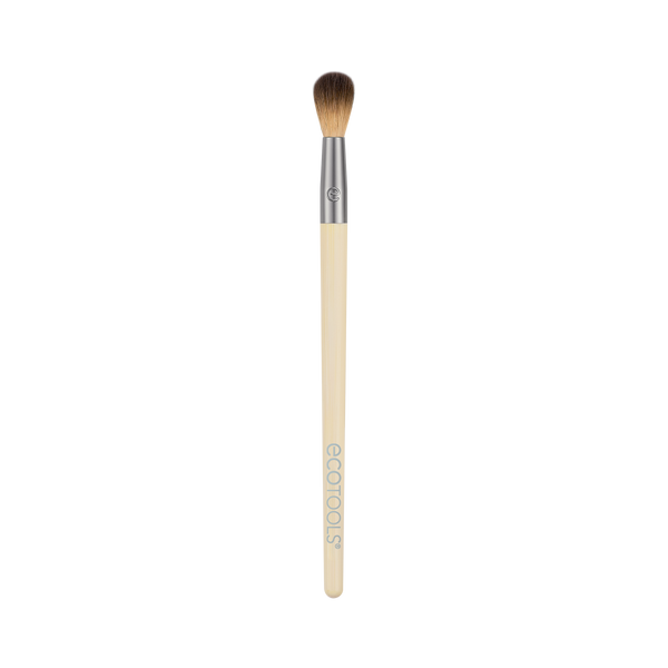 Tapered eye crease makeup brush with beige handle and dense brown bristles