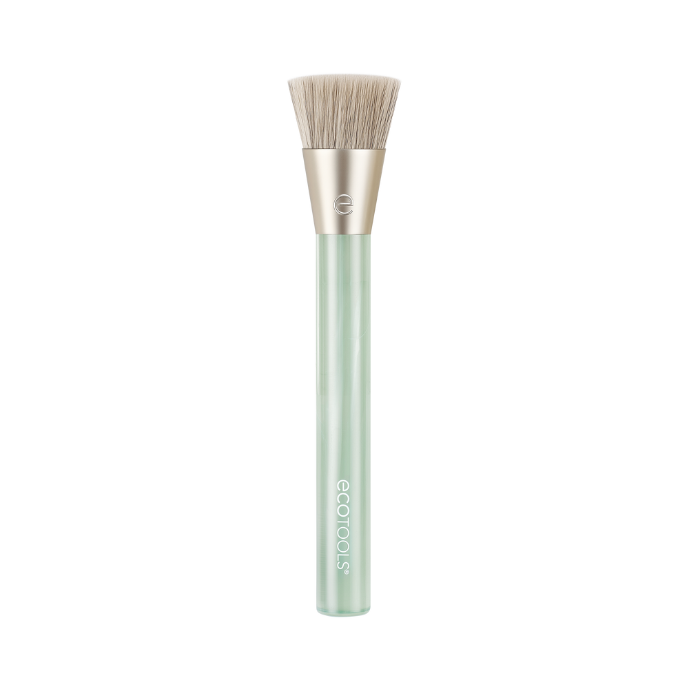 Mint green liquid and cream blending brush with soft white bristles
