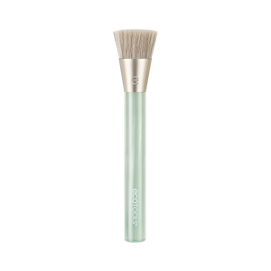Mint green liquid and cream blending brush with soft white bristles