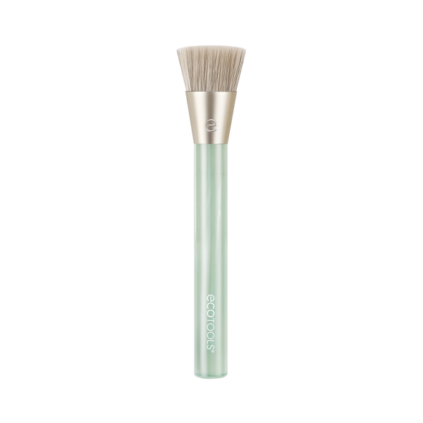 Mint green liquid and cream blending brush with soft white bristles