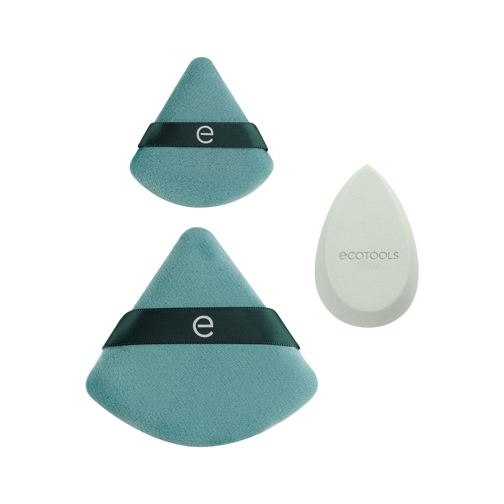 Teal triangular blending sponges and one white teardrop setting sponge