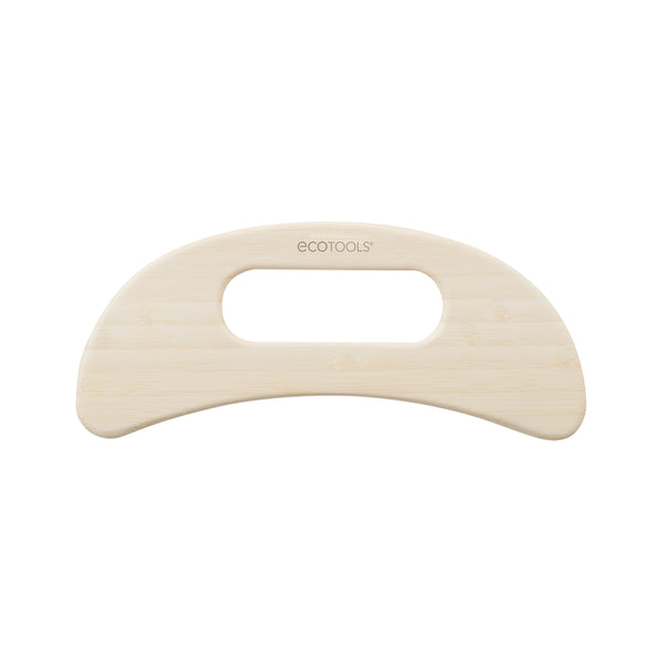 Light wood bamboo body massager with oval hand grip and cutout