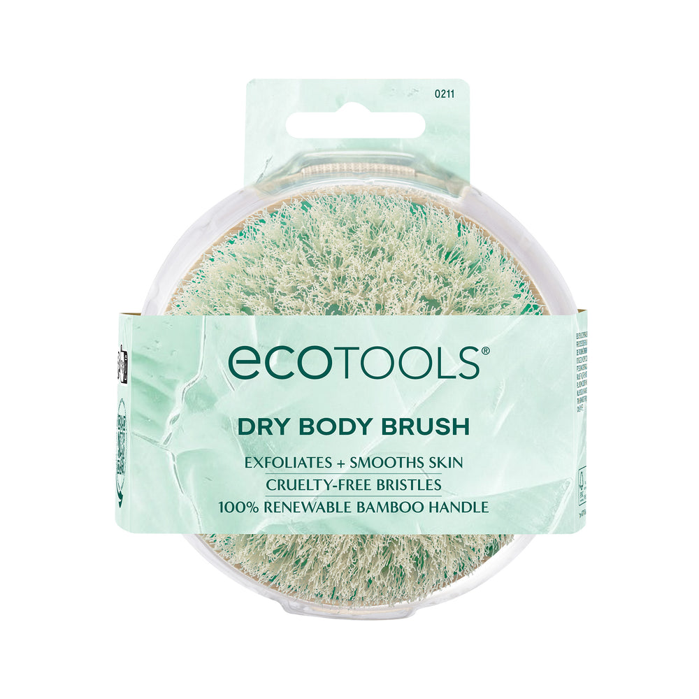 Dry body brush head with green-tinted exfoliating fibers in a circular shape
