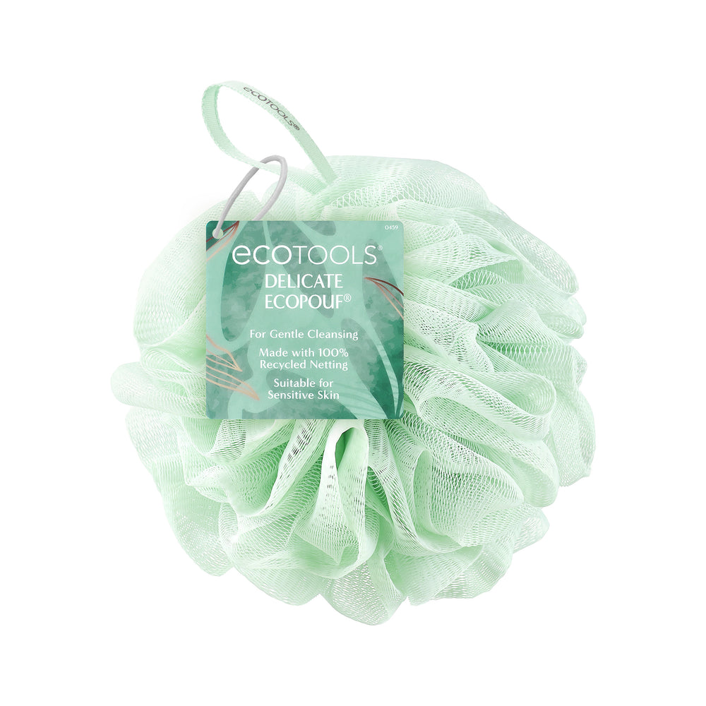 Delicate pouf: mint green mesh scrub ball with hanging loop and printed label