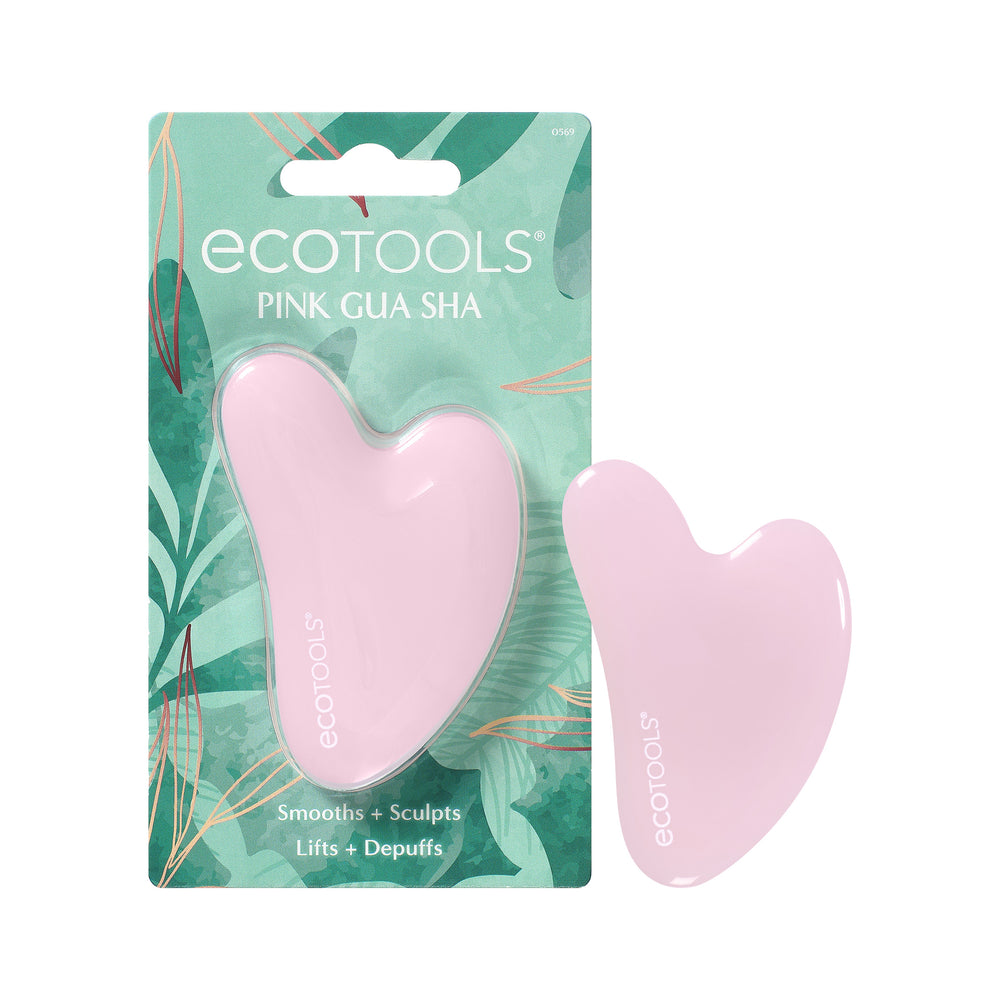 Pink heart-shaped gua sha facial massage tool with smooth edge