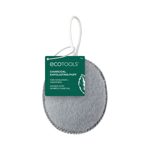 Grey oval exfoliating puff with hanging cord and ECOTOOLS charcoal tag
