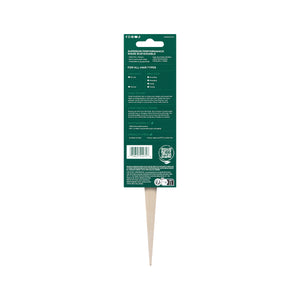 Slick back brush in upright back view with cream handle and black bristles
