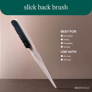Slick back brush angled with cream handle and black bristle brush head