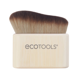 Self-tan blending brush with angled dark bristles and light bamboo handle, ECOTOOLS logo
