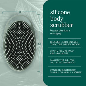 Silicone body scrubber with oval bristle side featuring raised circular massage nodes