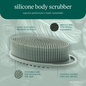 Sage green silicone body scrubber with hanging handle and two-sided textured design