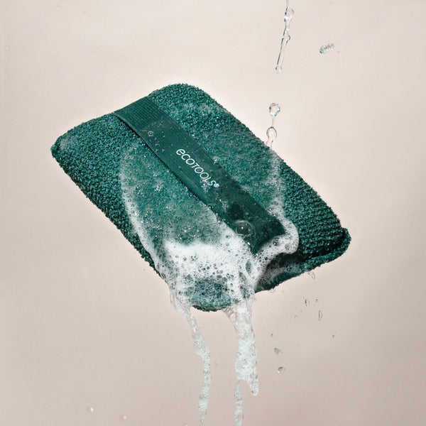 Dark green XL Body Buffer scrub cloth with water droplets and strap