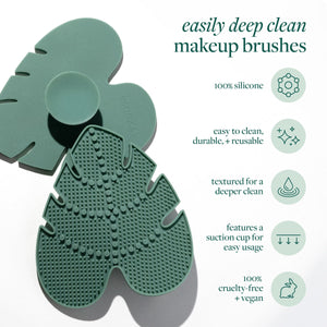 Green silicone makeup brush cleansing pad with textured surface and suction cup feature