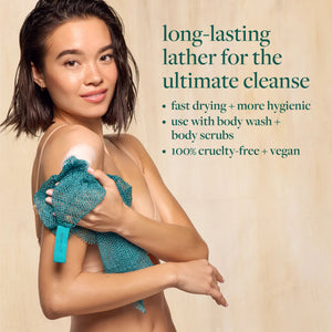 Teal exfoliating bath net held in hands; textured scrub mesh with teal tag
