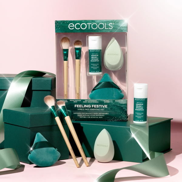 Face makeup gift set in a box with two brushes, sponges, powder puff, and cleanser bottle