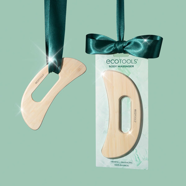 Bamboo body massager with retail box and teal bow ribbon