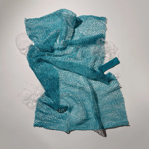 Teal exfoliating bath net with hanging loop and woven scrub mesh texture