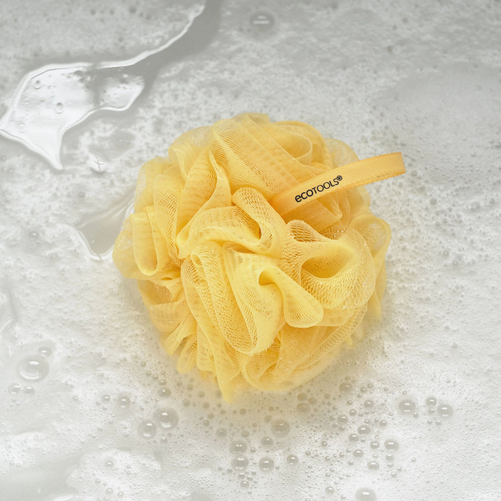 Yellow EcoPouf mesh flower bath sponge with ecotools product label