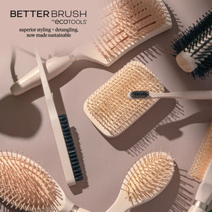 Slick back brush set with white handle and boar-style bristles, paddle shape