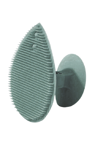 Light gray silicone facial scrubber pad with ridged texture, round shape