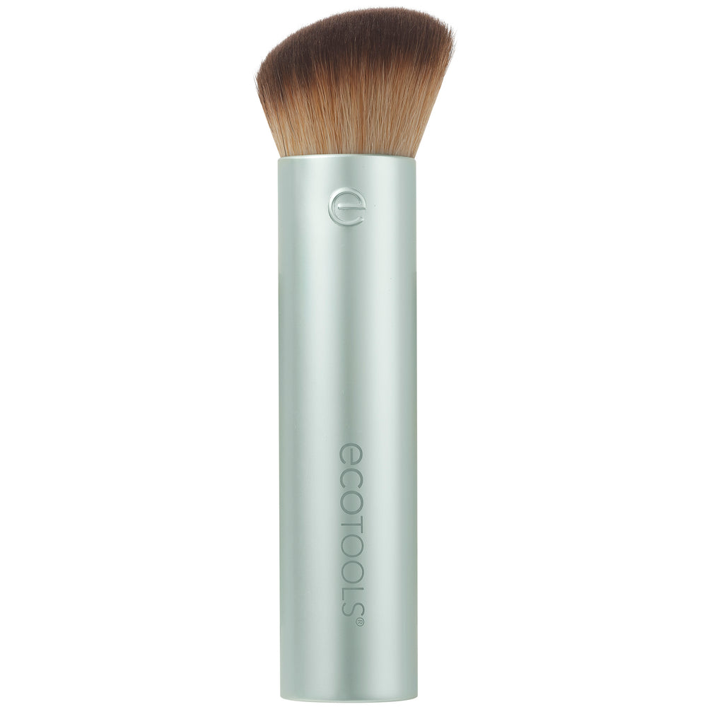 Flawless coverage makeup brush with dense angled bristles on light gray barrel