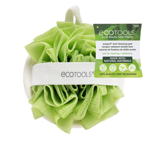 Green ECOTOOLS® dual cleansing pad with hang tag stating made with natural materials