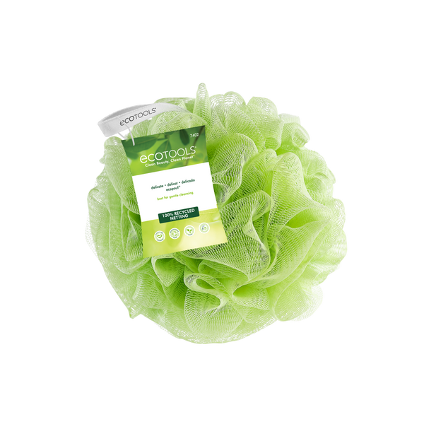 EcoTools delicate bath sponge in lime green, with product label