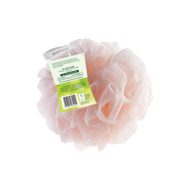 EcoTools delicate bath sponge in blush pink, with product label