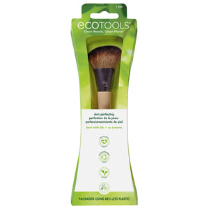 Skin perfecting makeup brush in green retail packaging with domed bristle head