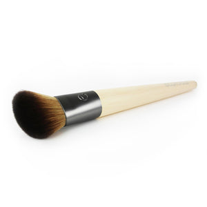 Skin perfecting makeup brush angled view with domed bristle head and silver ferrule